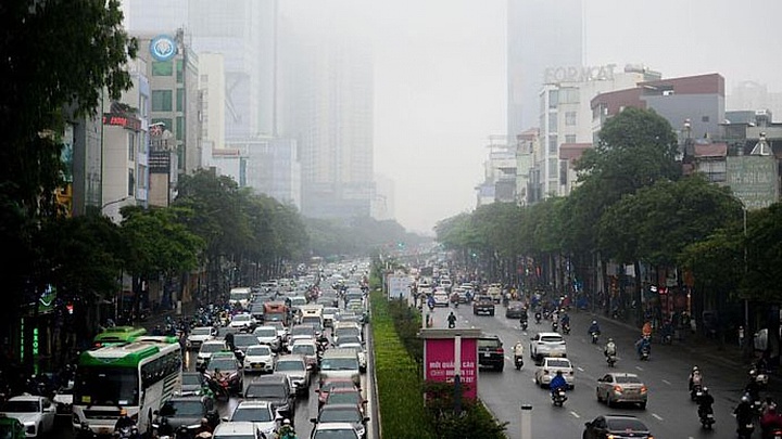 High-rise buildings hidden amid dense fog in Hanoi