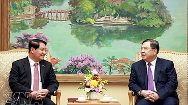 Standing Deputy PM receives Vientiane capital’s leader