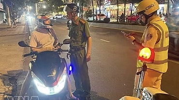 Vietnam could tighten local oversight of foreigners as arrivals hit record highs
